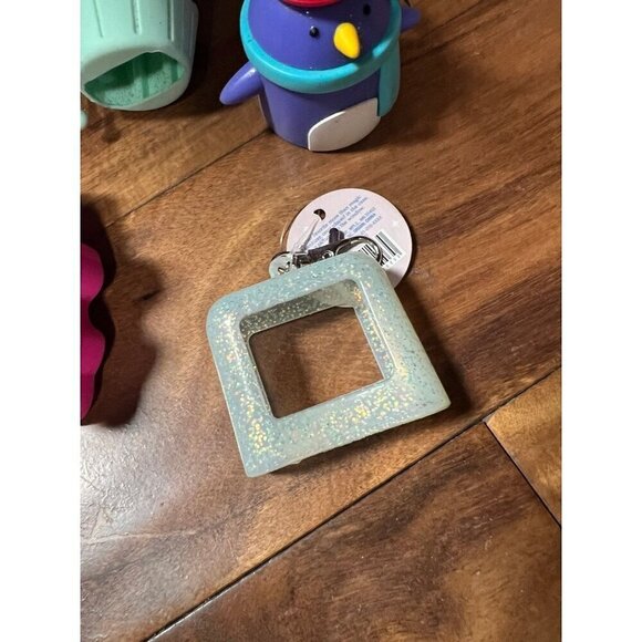 Lot of 6 hand sanitizer cases.   Good vibes, cupcake, penguin, melon - Picture 7 of 7